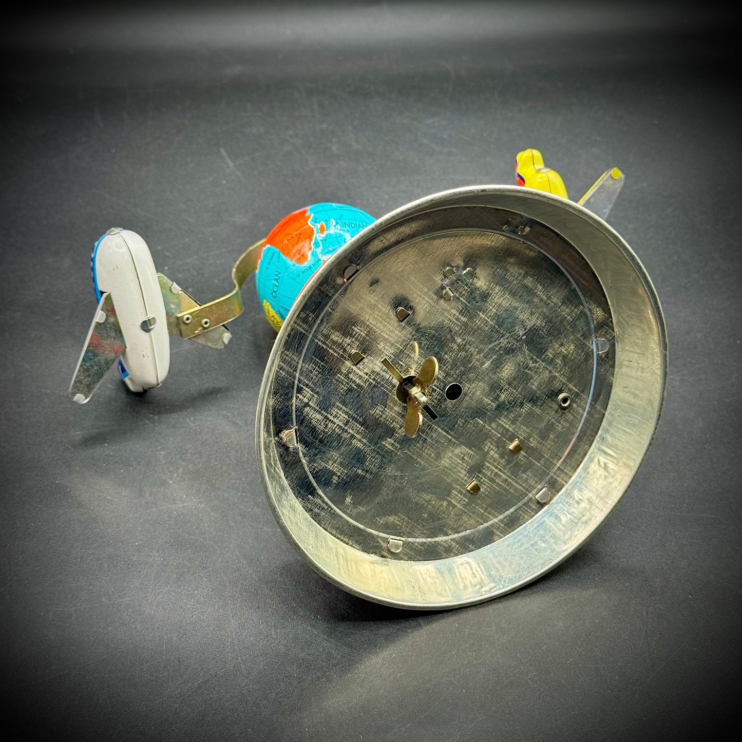 Vintage Wind Up Tin Toy with Jet Age Travel Motif