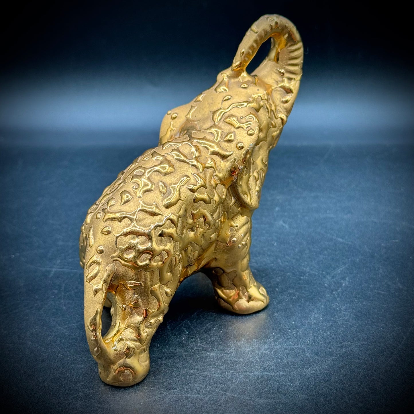 Vintage Weeping Gold Trunk Up Elephant Figurine