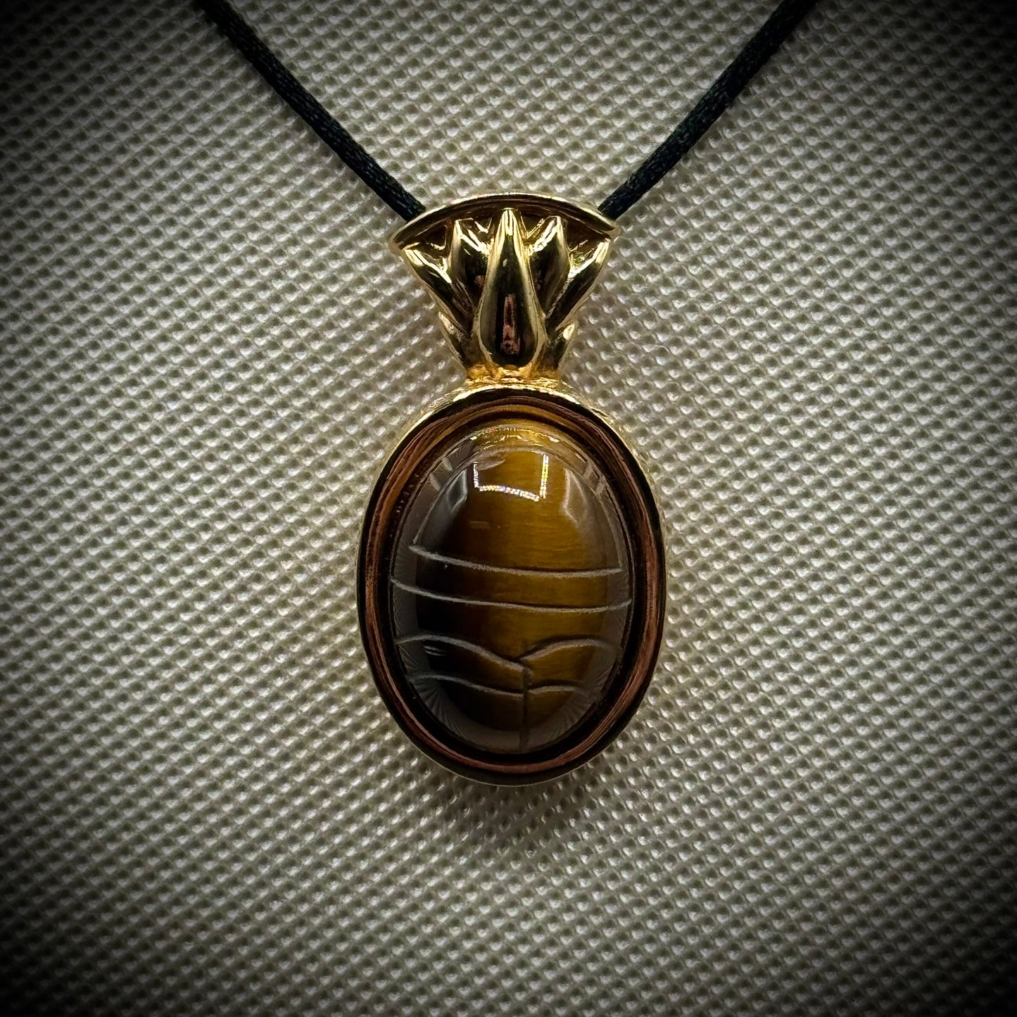 Kenneth J. Lane Egyptian Scarab Carved Tiger Eye Pendant on Black Silk Cord