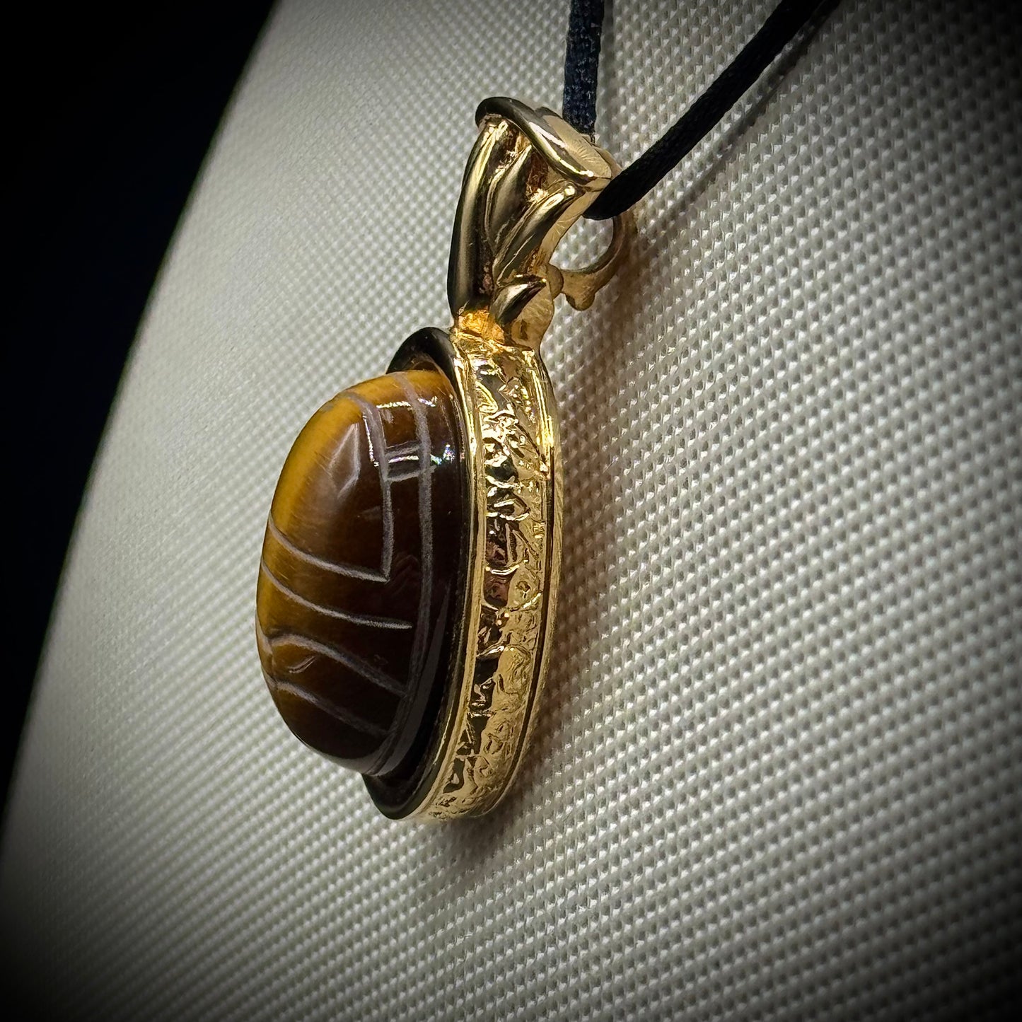 Kenneth J. Lane Egyptian Scarab Carved Tiger Eye Pendant on Black Silk Cord
