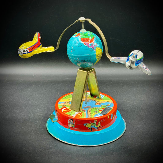 Vintage Wind Up Tin Toy with Jet Age Travel Motif