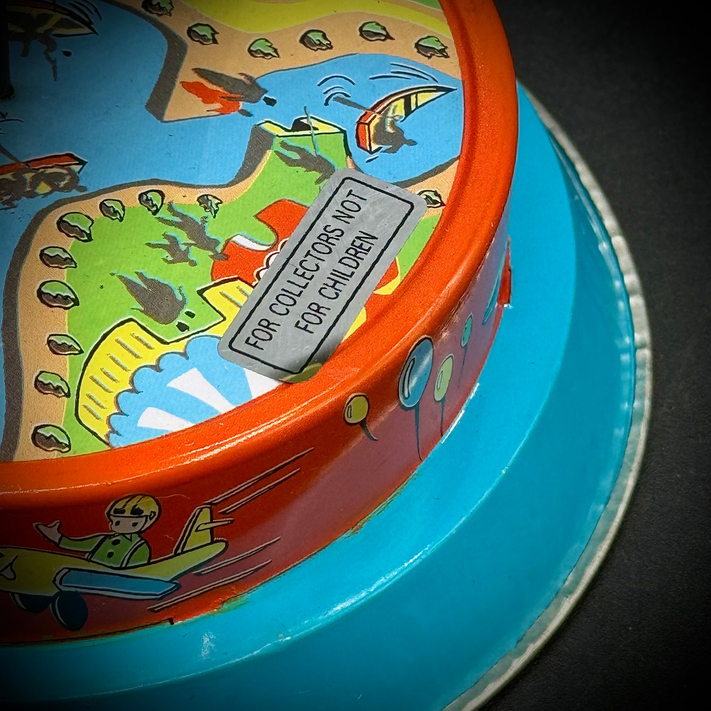 Vintage Wind Up Tin Toy with Jet Age Travel Motif