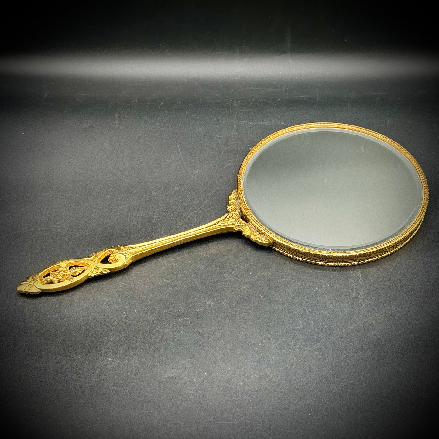 Hollywood Regency Large Hand Mirror with Ornate Scrollwork