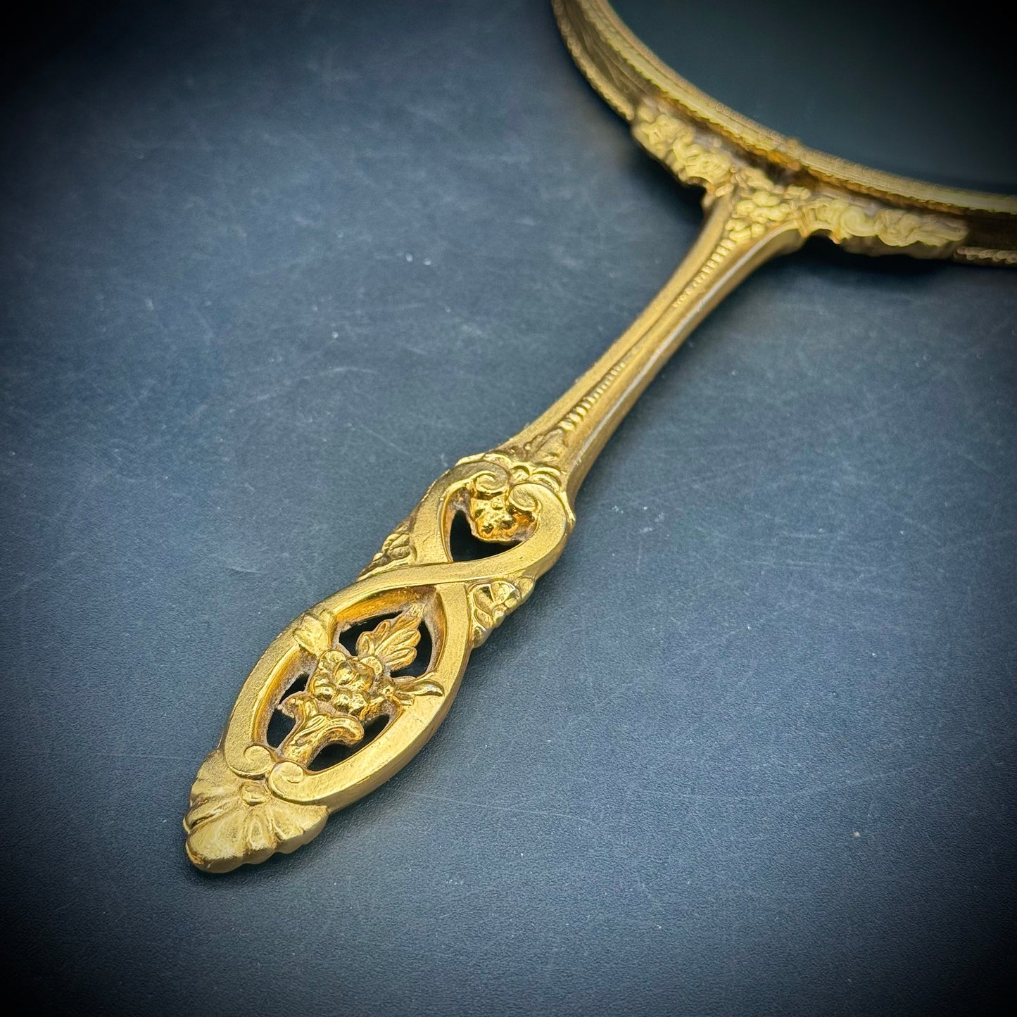 Hollywood Regency Large Hand Mirror with Ornate Scrollwork