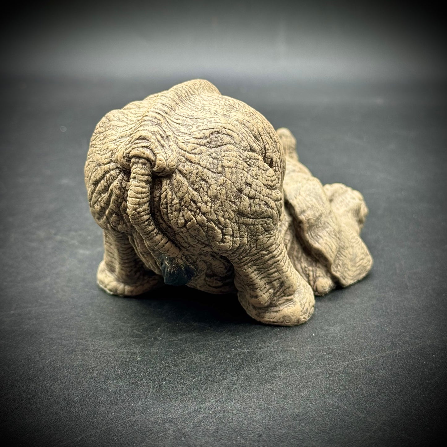 The Herd "Flop" Crouching Elephant Figurine