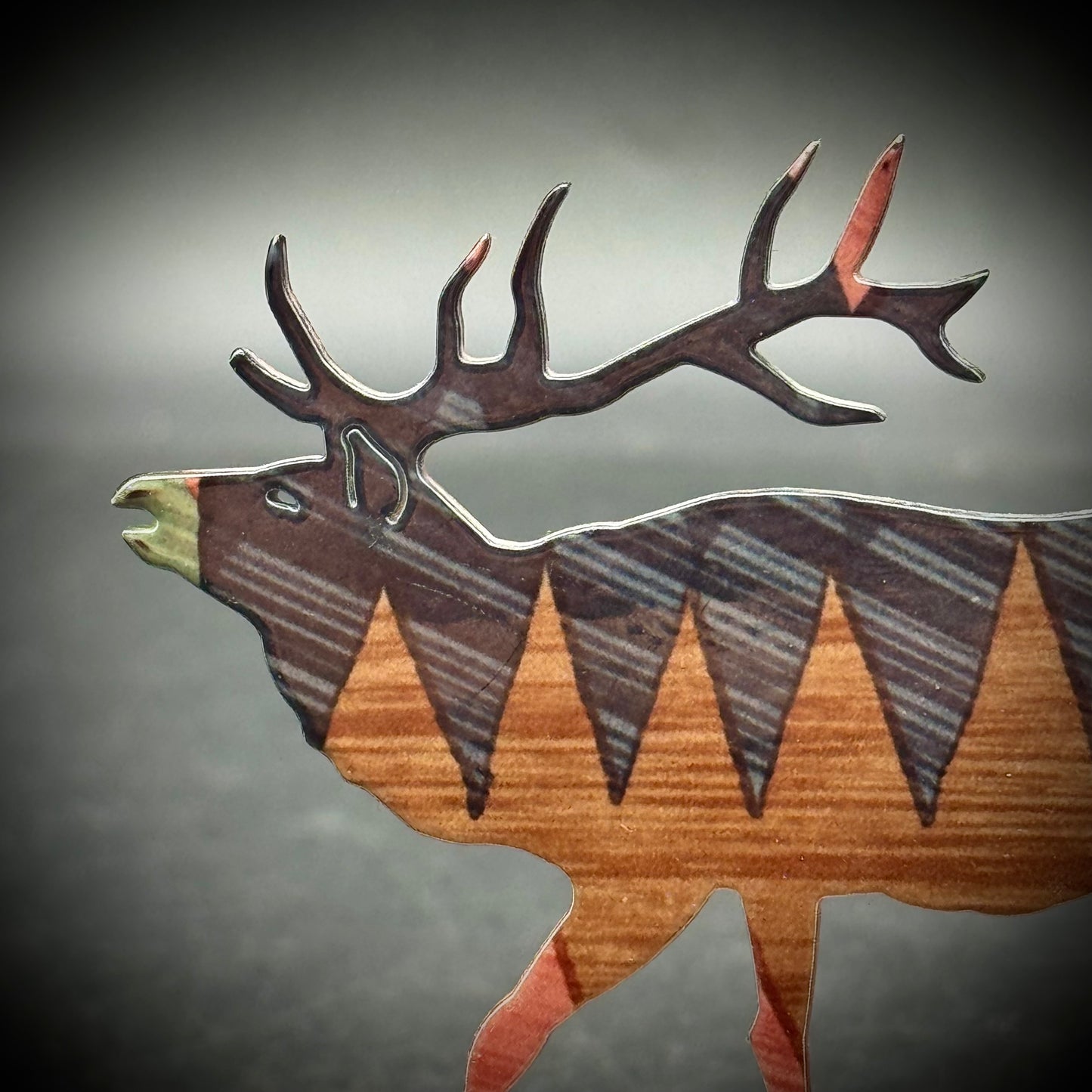 Metal Elk Sculpture on Sandstone Base