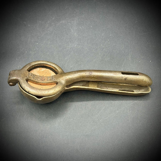 Antique Cast Iron and Wood Pearl Citrus Squeezer
