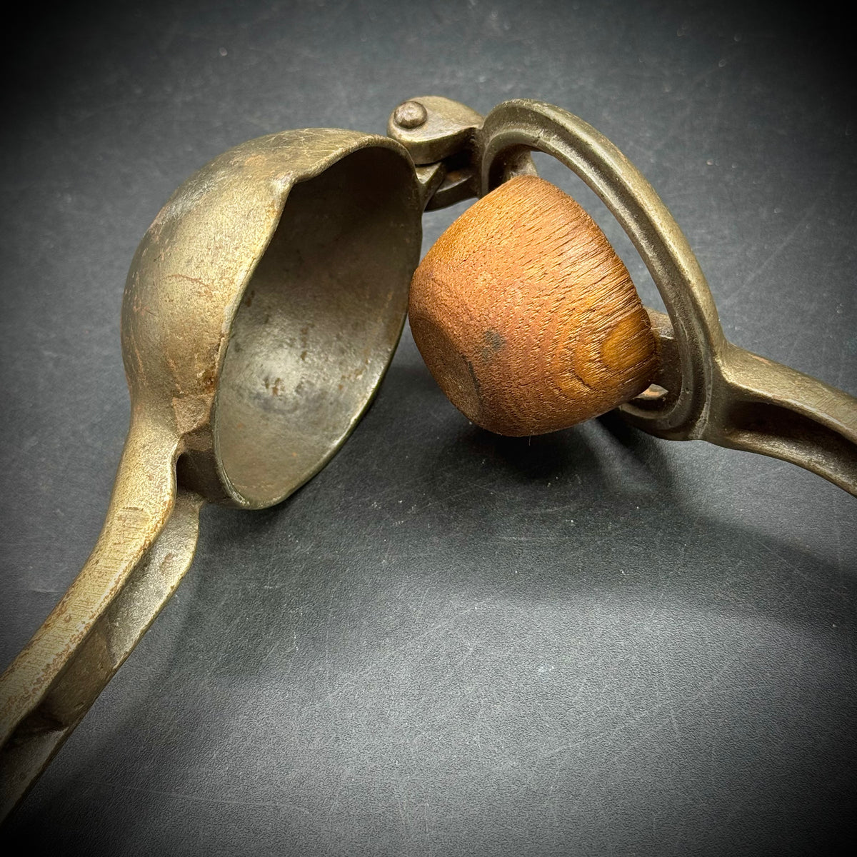 Antique Cast Iron and Wood Pearl Citrus Squeezer