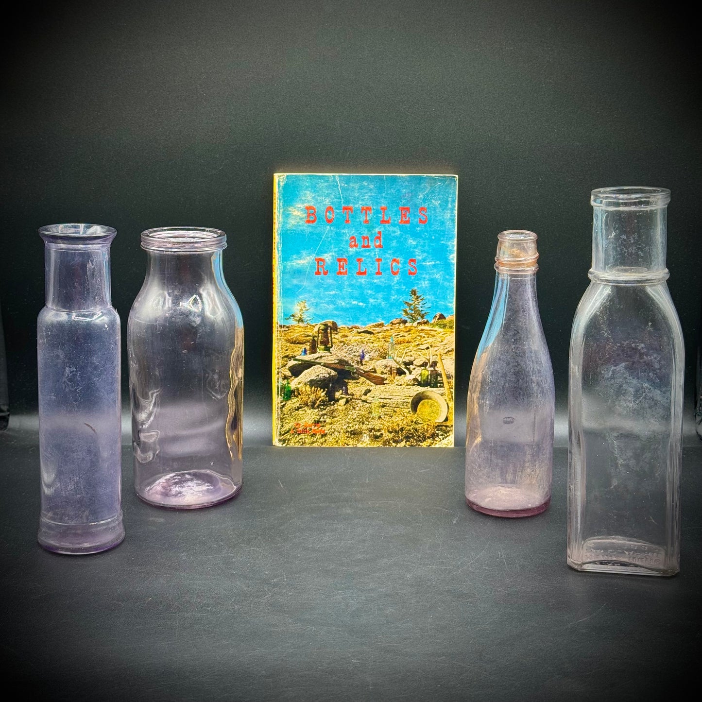 Collection of 4 Antique Glass Bottles & Book #1