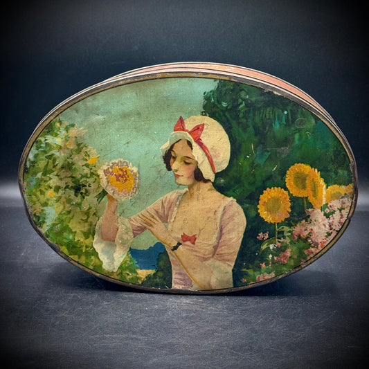 Antique Lidded Large Oval Tin with Woman & Flower Motif
