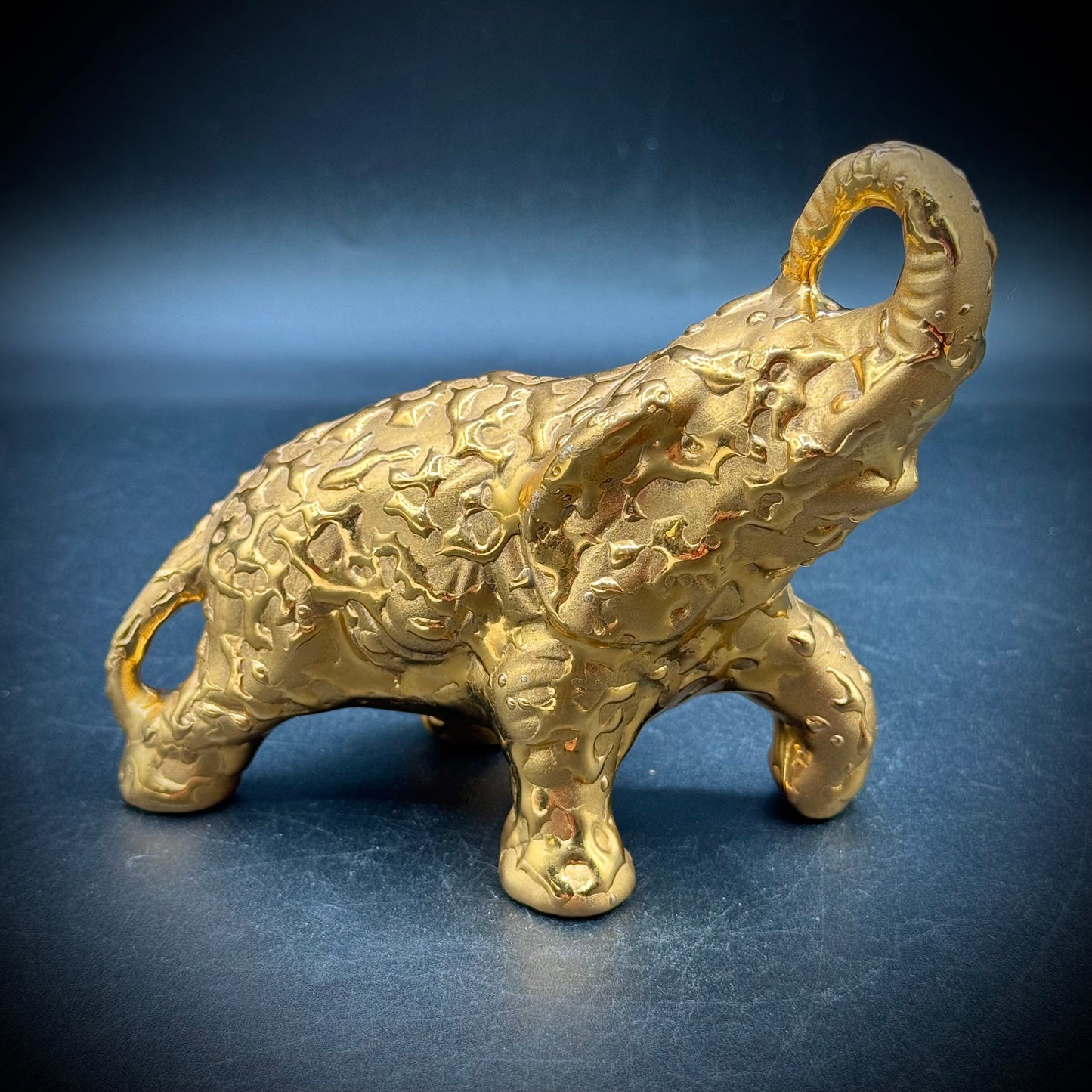 Vintage Weeping Gold Trunk Up Elephant Figurine