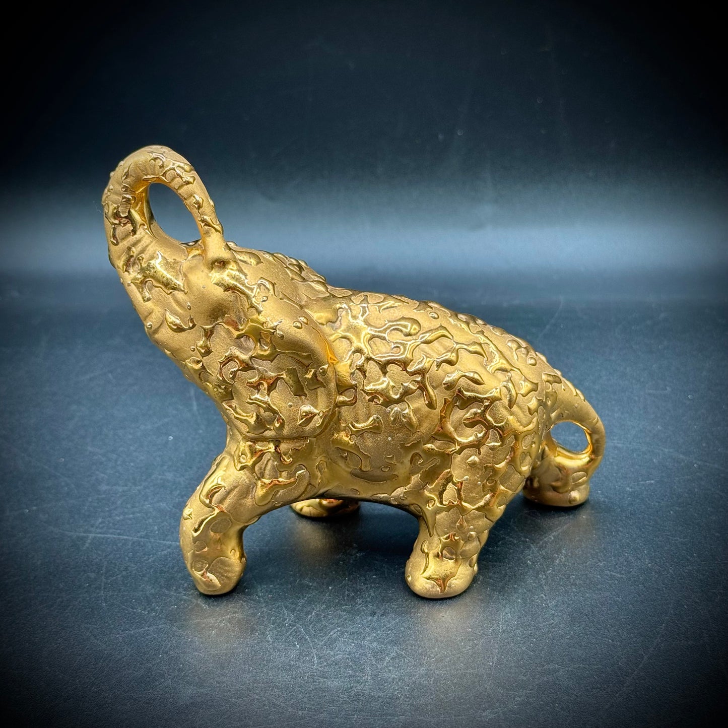 Vintage Weeping Gold Trunk Up Elephant Figurine