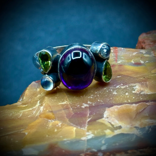 Sterling Silver Ring with Cabochon Amethyst Accented with Moonstones & Peridots