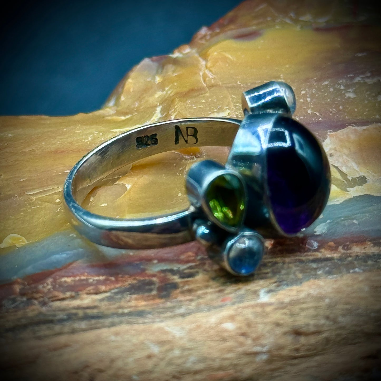 Sterling Silver Ring with Cabochon Amethyst Accented with Moonstones & Peridots