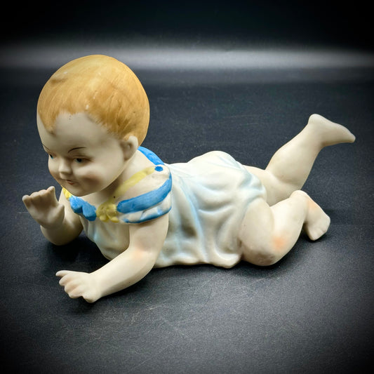 Vintage Porcelain Piano Baby